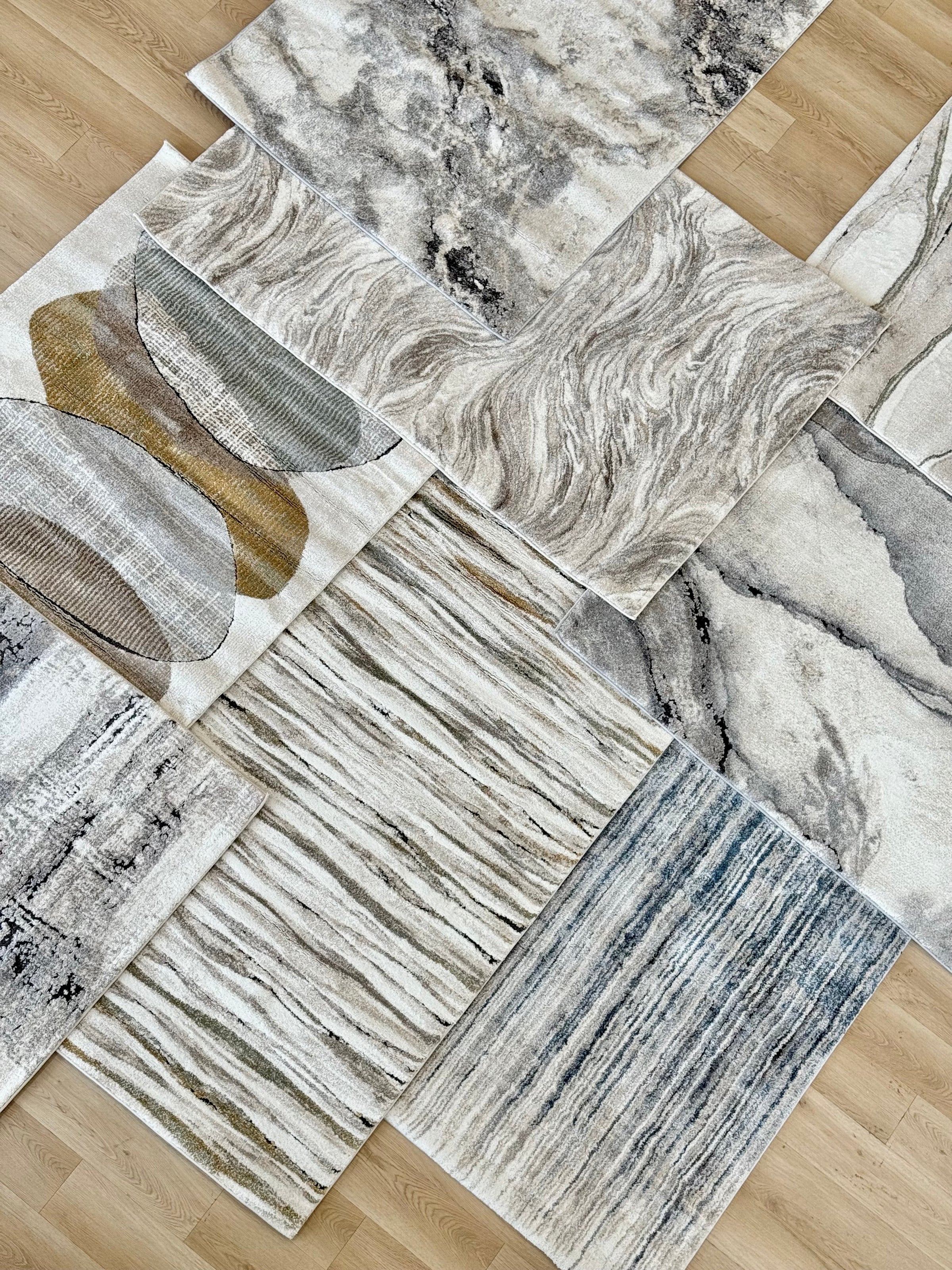 Plush area rugs, easy clean, neutral tones
