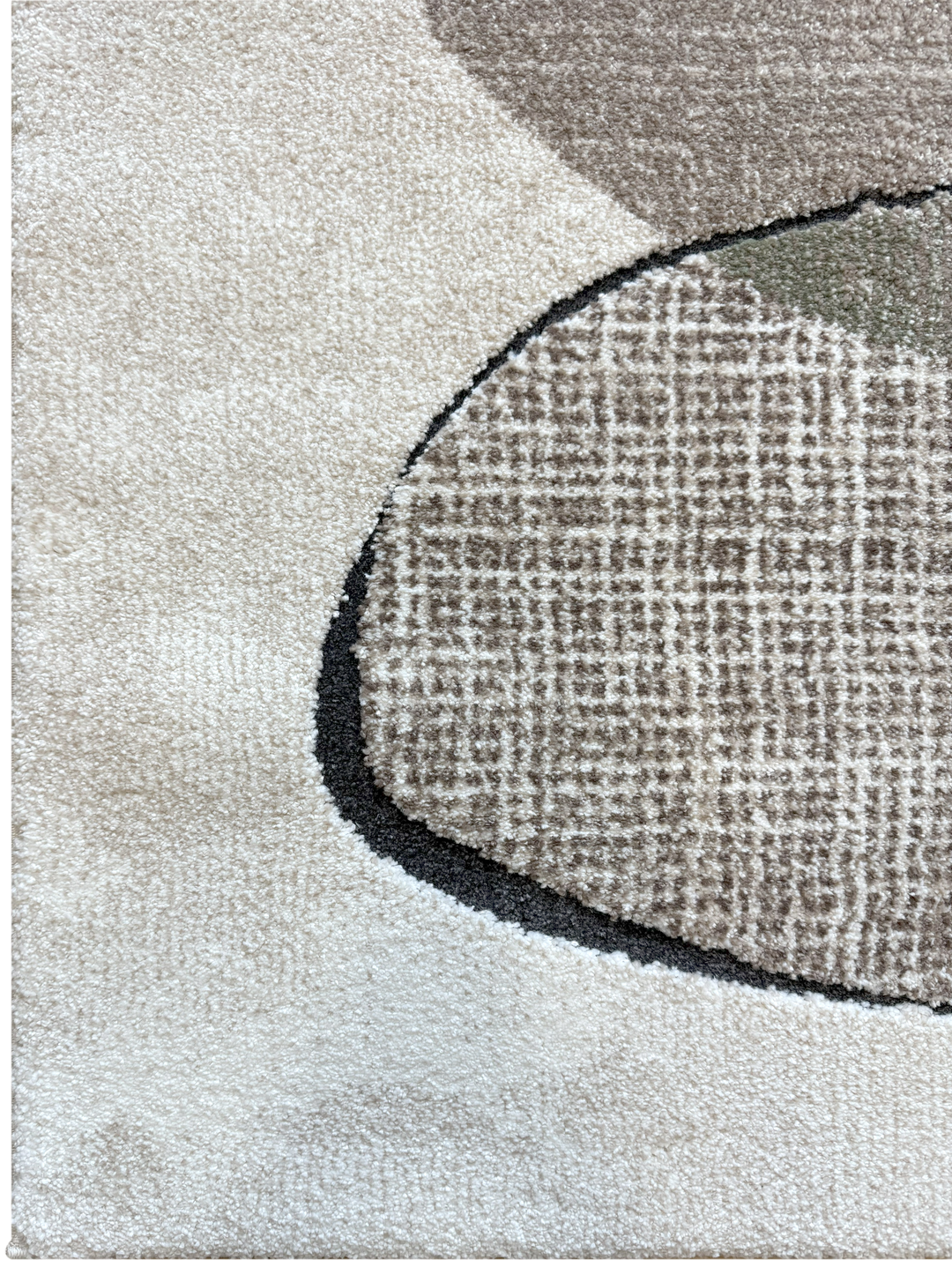 Close-up of a textured rug with geometric pattern on a light background