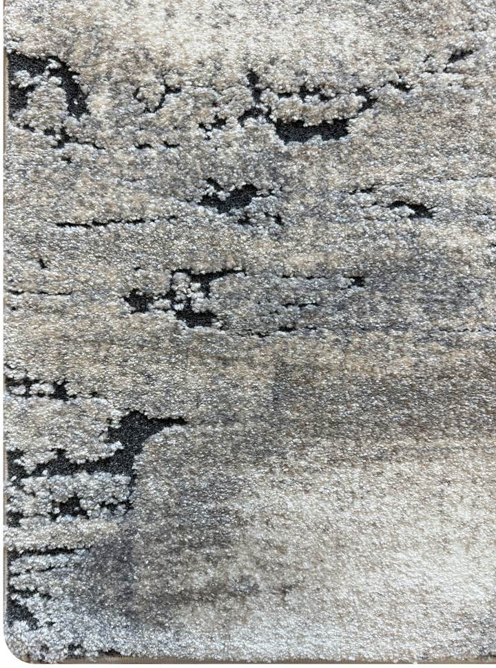 Neutral modern area rug with weathered texture pattern
