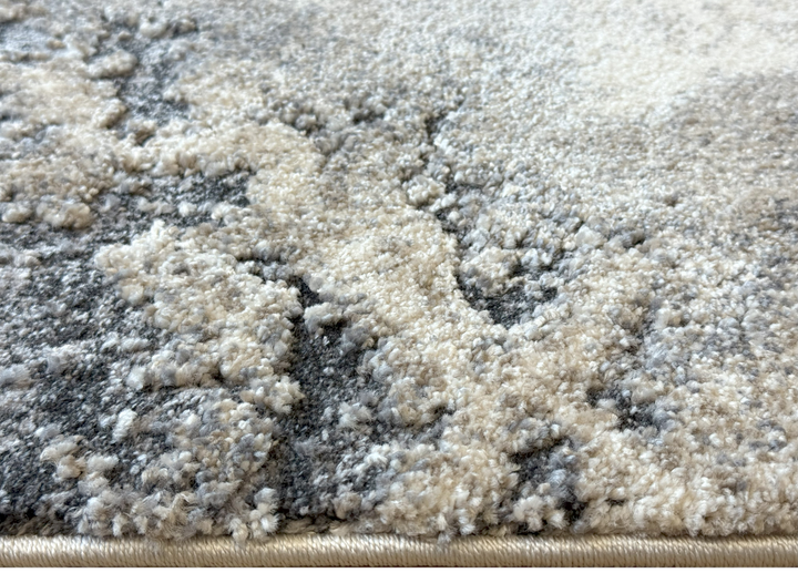 Close-up of a textured surface with white gray taupe colors