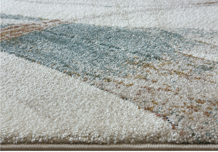 Arlo 2962 abstract area rug with green, teal, and burnt orange over a neutral base