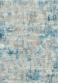 Modern distressed rug with layered ivory, sky blue, taupe, and denim tones. Low, flat pile Ginza 20.