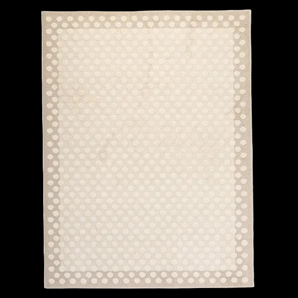 Neutral kids polka dot plush rug