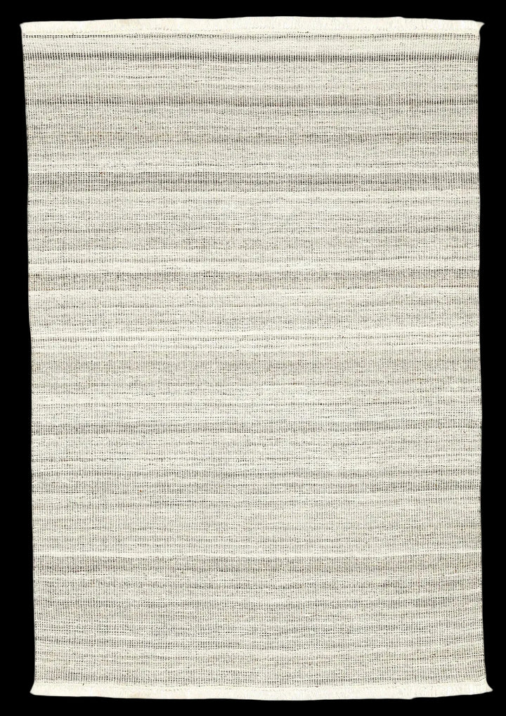 Textured area rug with a neutral colours, recycled polyester, easy clean, reversible