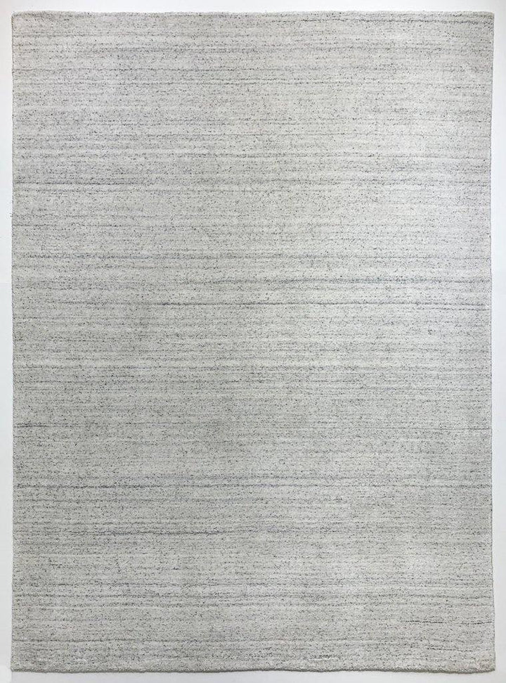 Akita Ivory Flek rug overall view white base dark grey flek horizontal texture