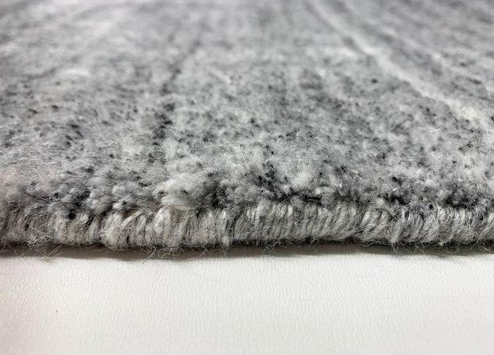 Akita Light Grey rug side view light grey base dark grey flek horizontal texture